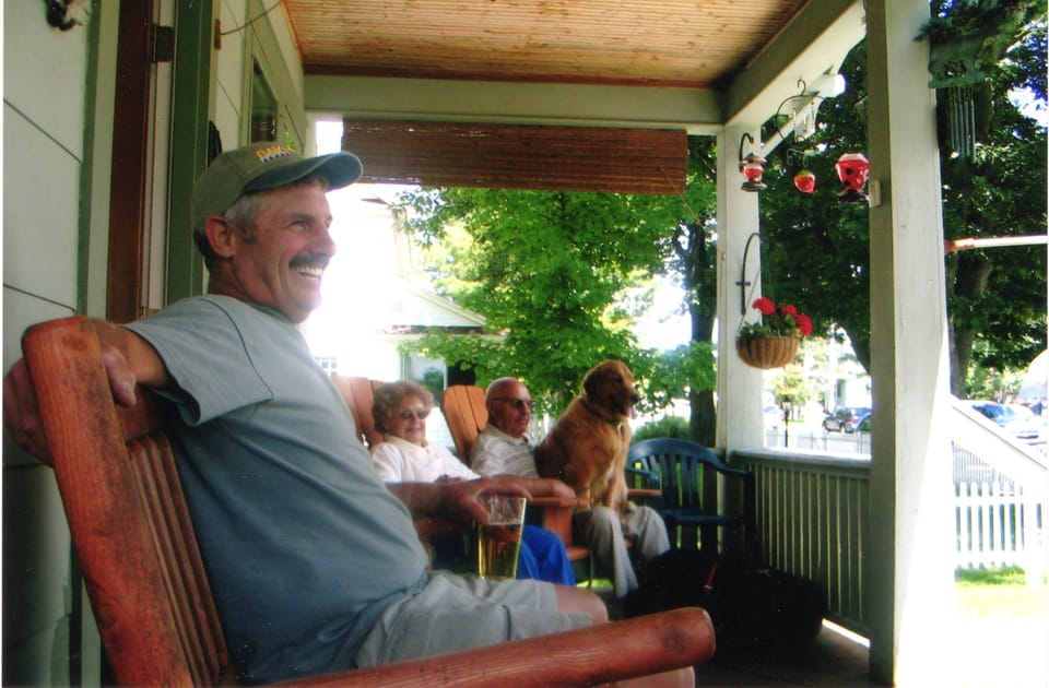 Jim Enjoying Front Porch with parents.