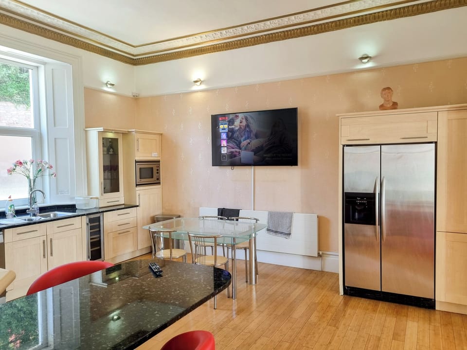 Kitchen with Smart TV | Riviera Mansion, Torquay