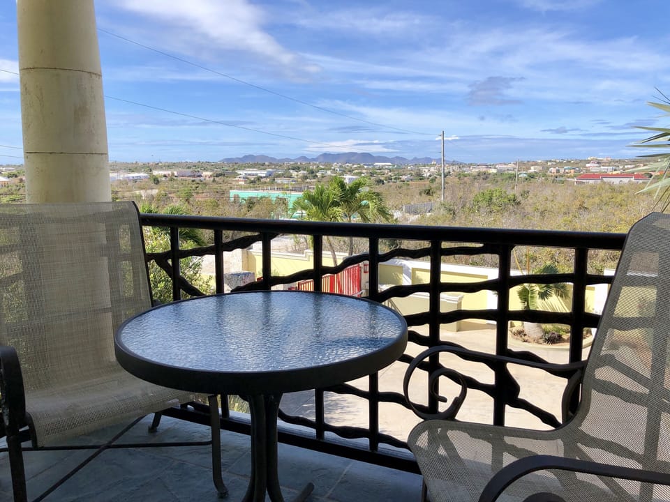 Covered balcony with the view over the hills of Sint Maarten / Saint Martin