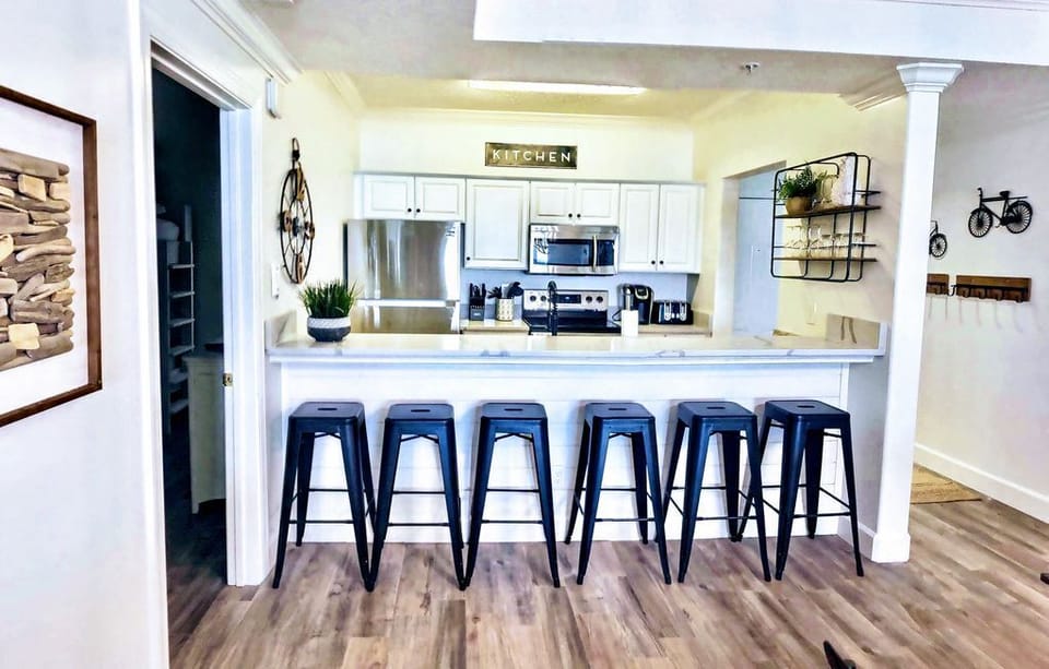 plenty of bar counter height seating at the new quartz counters