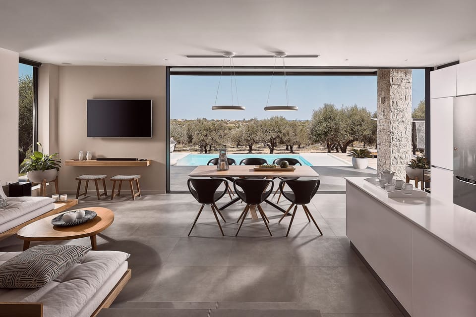 Open plan area consisted of the living room and kitchen with pool access