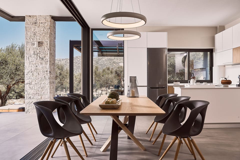 The dining and living room enjoys wonderful views of the olive grove.