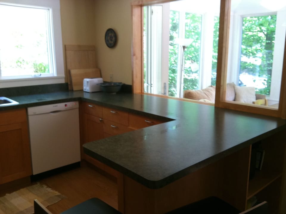 Kitchen opening to dining area.
