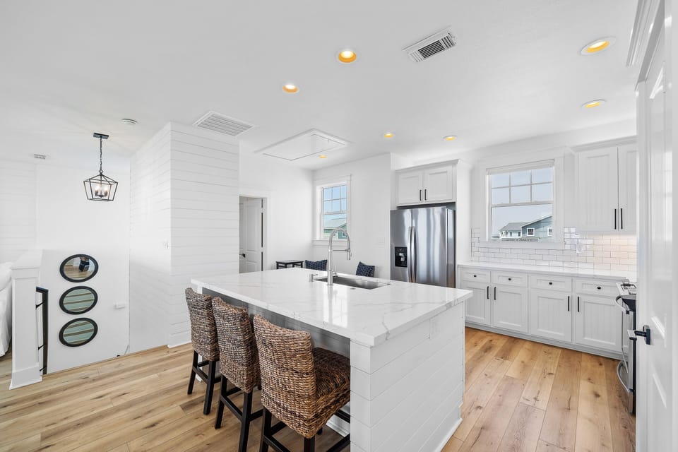Large quartz island with counter seating 