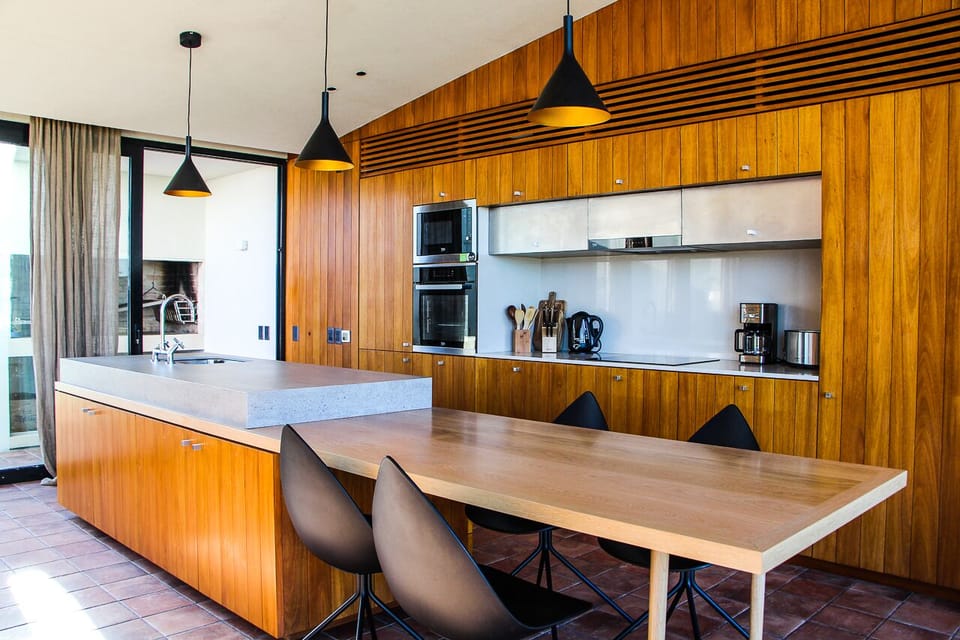 Kitchen with Access to BBQ Area and Courtyard