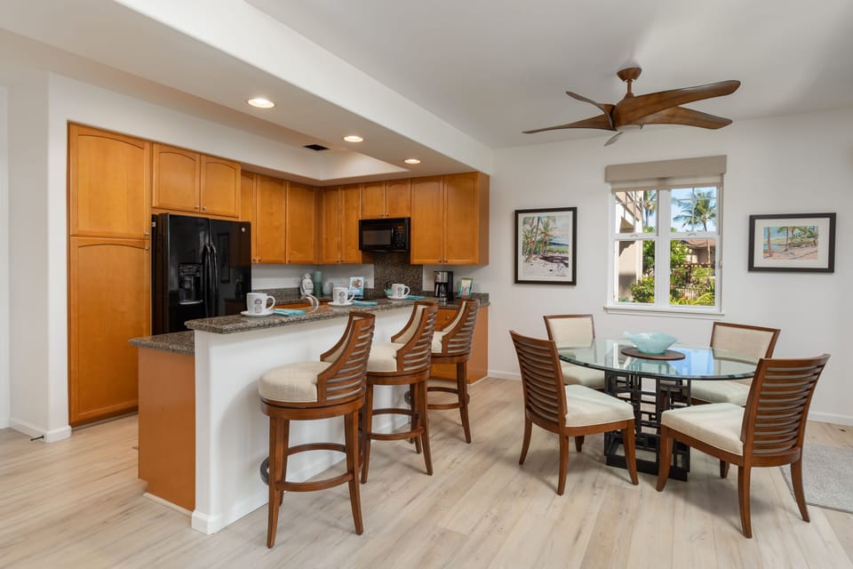 Dining Area with table seating for 4 and Breakfast bar