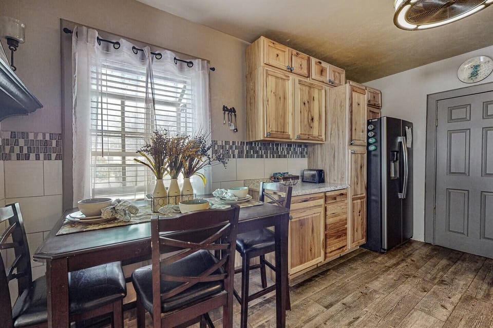 Kitchen shares a wall with a neighboring unit, but the home is 100% private. This home was built out as a town home with the ability to convert back to multi-family when needed.