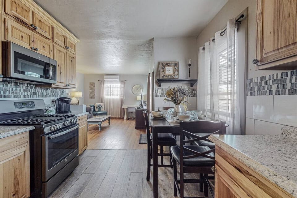 Kitchen area, photo taken from laundry room area which is co-located in kitchen.