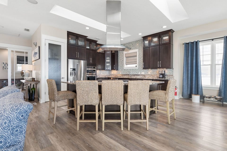 Seating at the Island to gather together to make and eat breakfast before hitting the beach. 3rd Floor