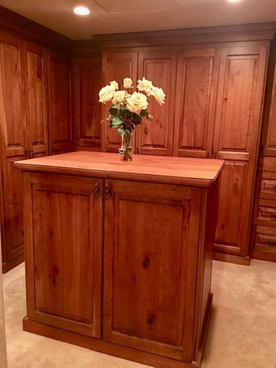 Spacious and roomy master closet area with vanity. 