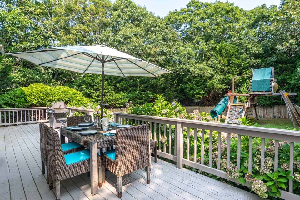 Deck is set Up for Outdoor Dining with Seating for Six