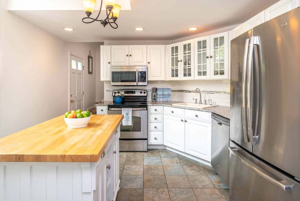 The New Kitchen Has Granite Counters, Center Butcher Block Prep Island