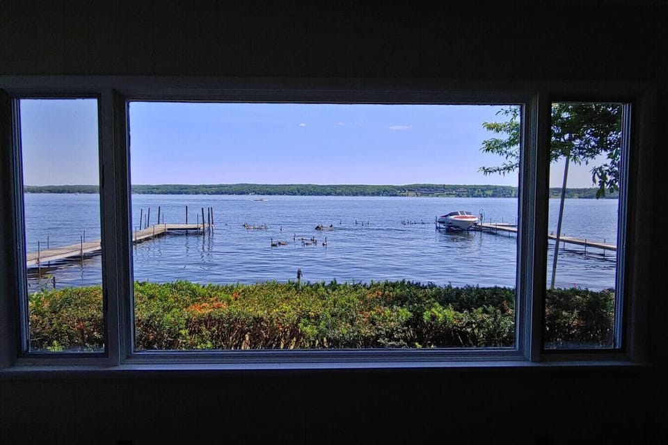 View of big window to the CHQ Lake with its beautiful bird life and docks.