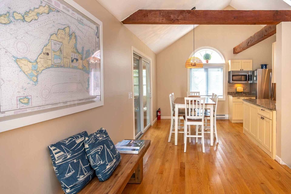 Open Dining Area Has Sliding Glass Doors Leading Out to the Sun Porch