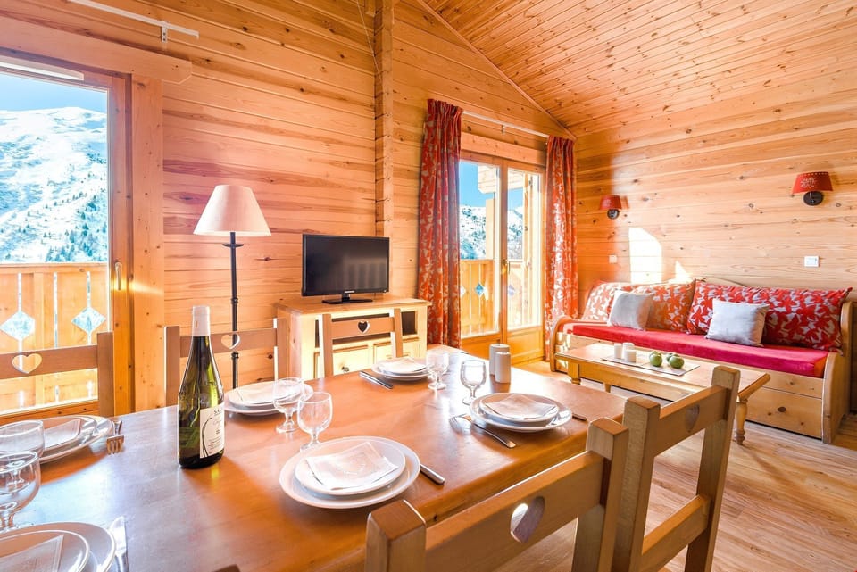 Prepare meals in the kitchenette and enjoy them at the dining table.