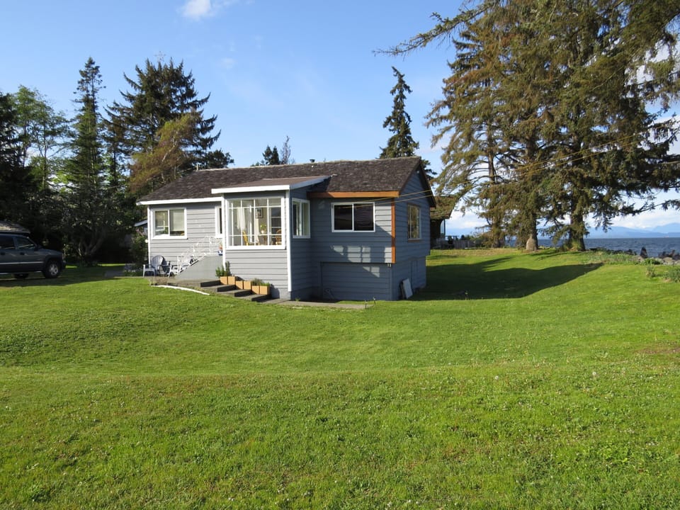 Beach House with lots of green space!