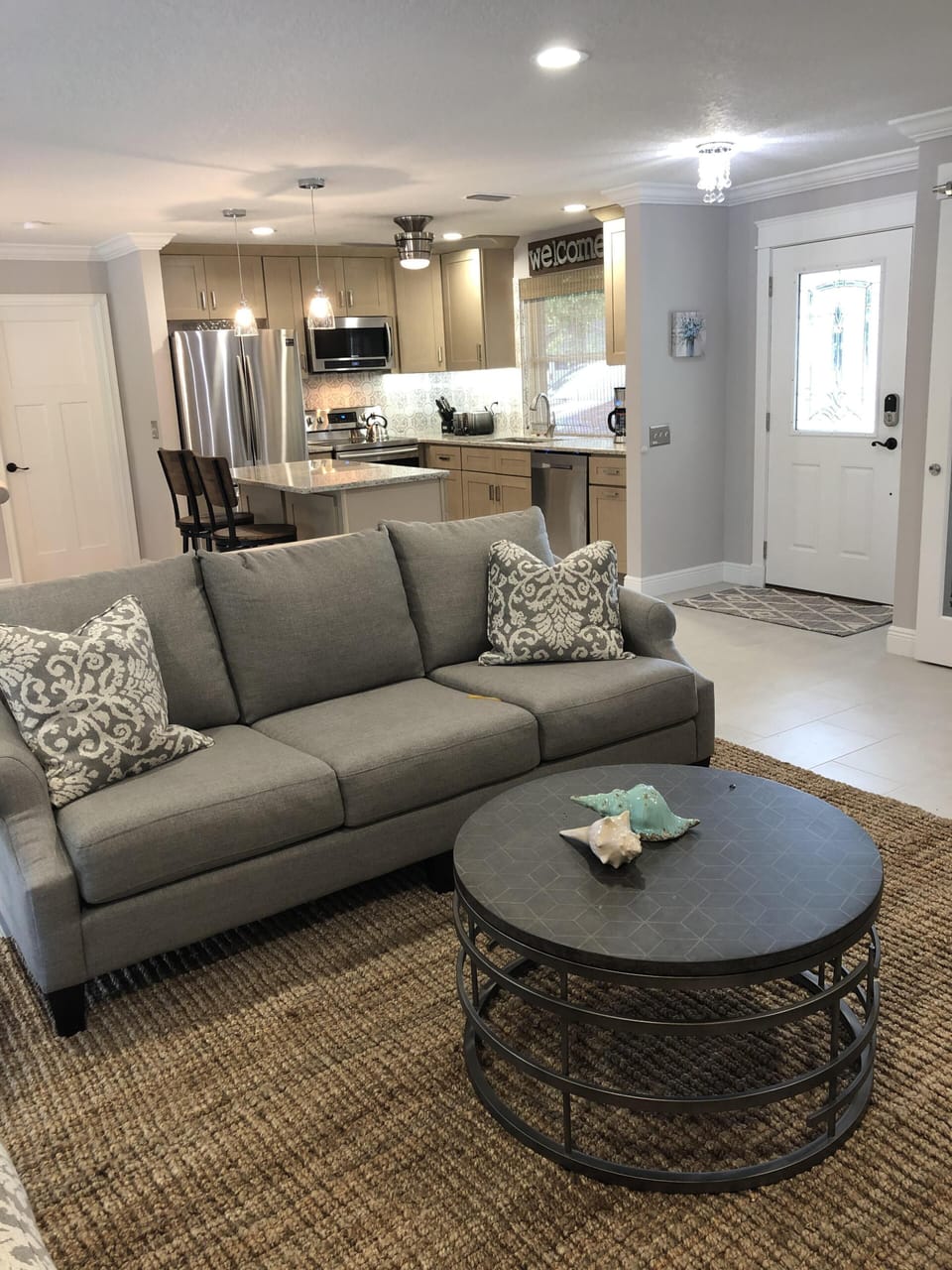 Living room with couch , Loveseat , chair and cable t.v 