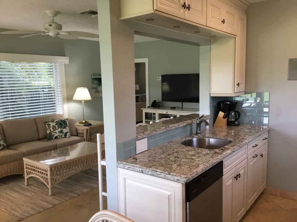 Kitchen looking into living room