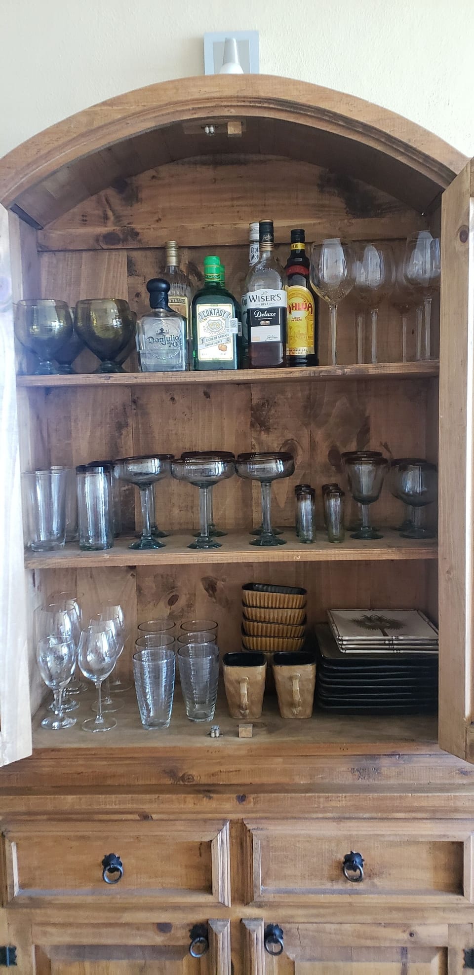 Handblown glassware and whatever alcohol prior guest left..  