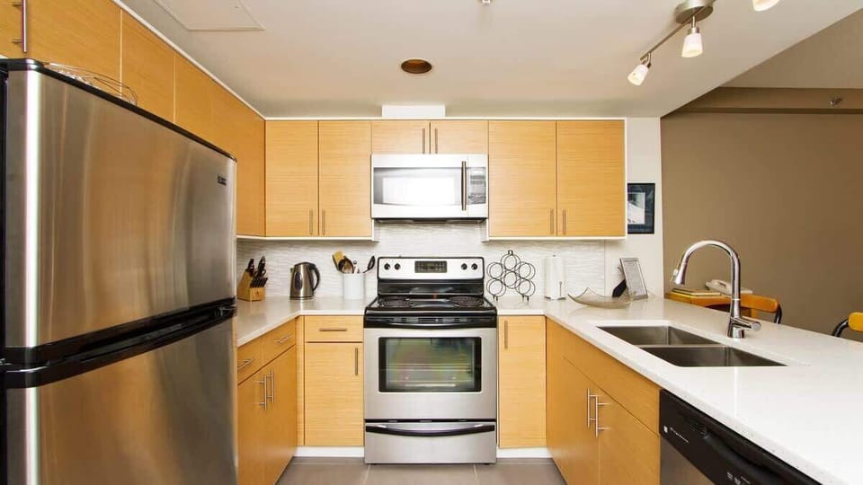 - Fully equipped Whistler kitchen with stainless steel design  
- Bright countertops and modern features for mountain living  
- Ideal for long stays and gourmet home-cooked dinners  