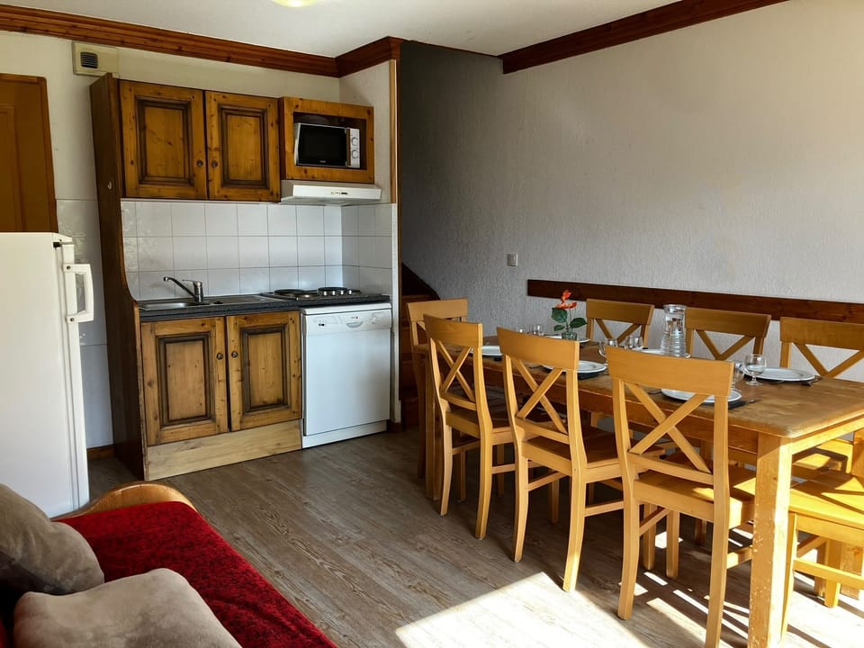 Cook family meals in the kitchenette, stocked for fueling days on snow