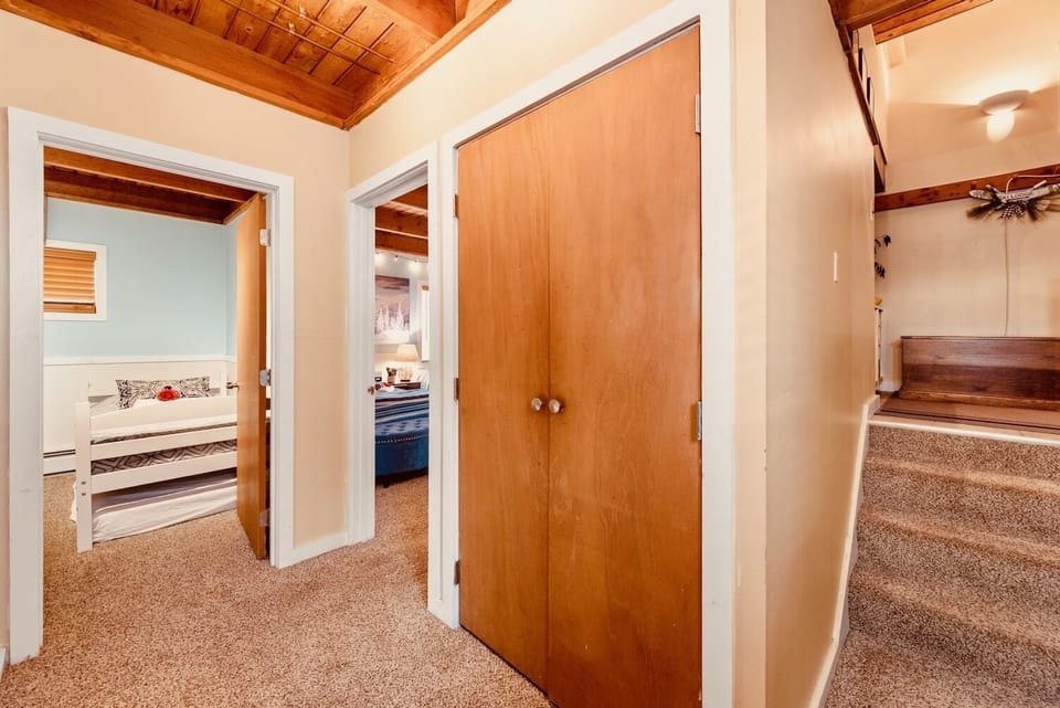 Downstairs hall looking into bunk + double full room