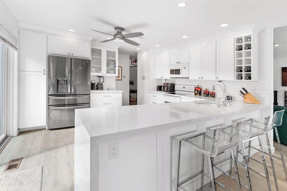Renovated kitchen with brand new appliances and wine cooler