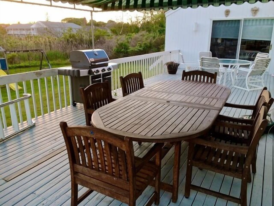 Outdoor Deck - large table seats 8, small table seats 6