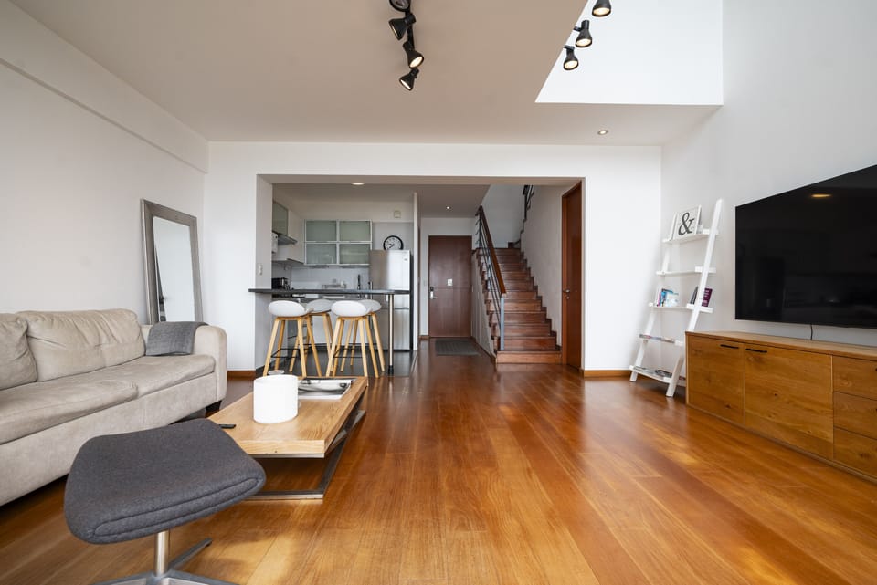 Feel at your own yoga studio in this generous Living room.