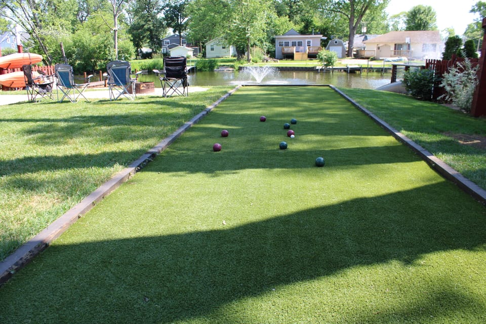 Bocce ball / bags / putting green / and in winter will be a crying court.
