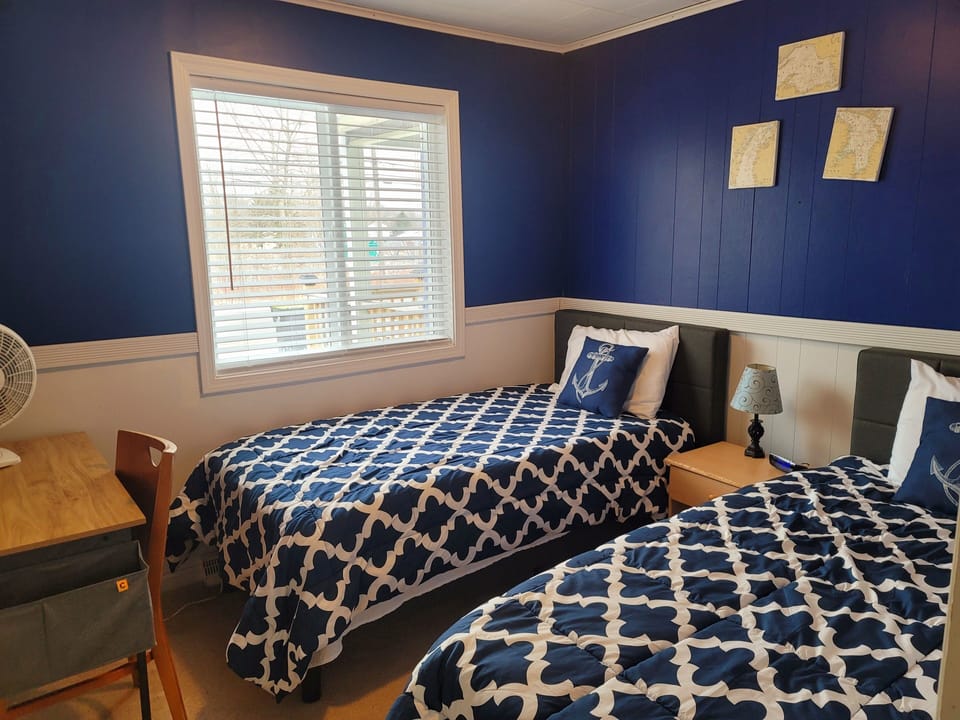 Bedroom 3, with 2 memory foam twin beds.  Also work desk.