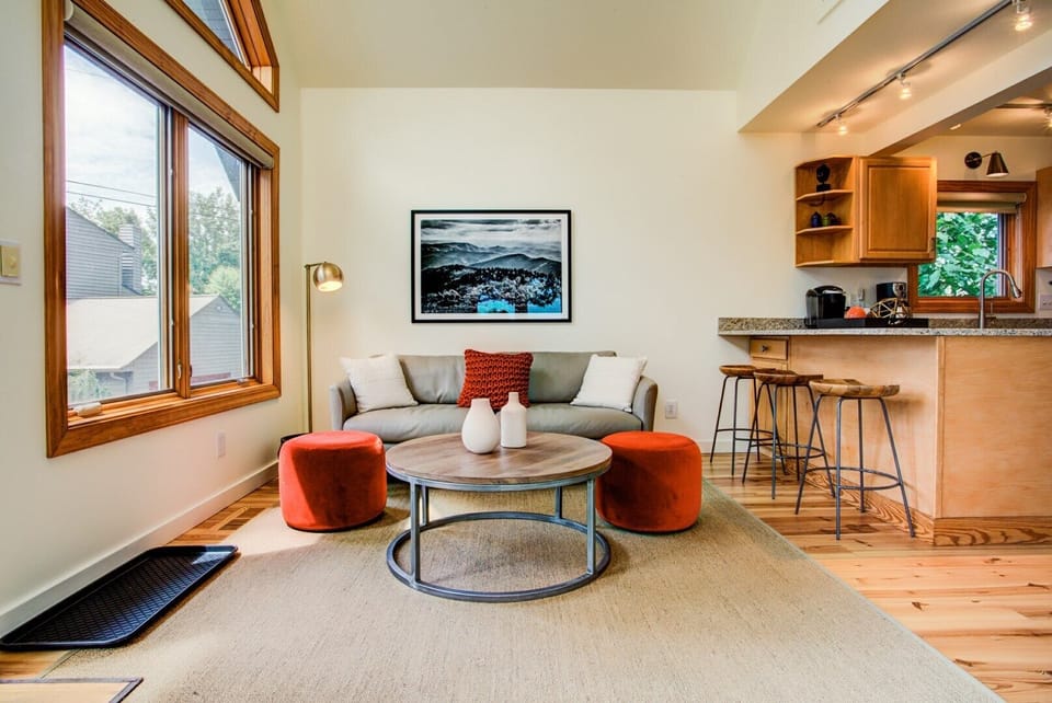 Kitchen bar seating and coffee table view