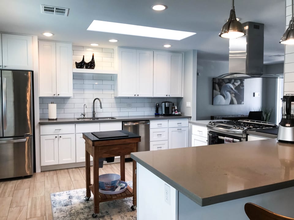 Bright kitchen with skylight and open layout