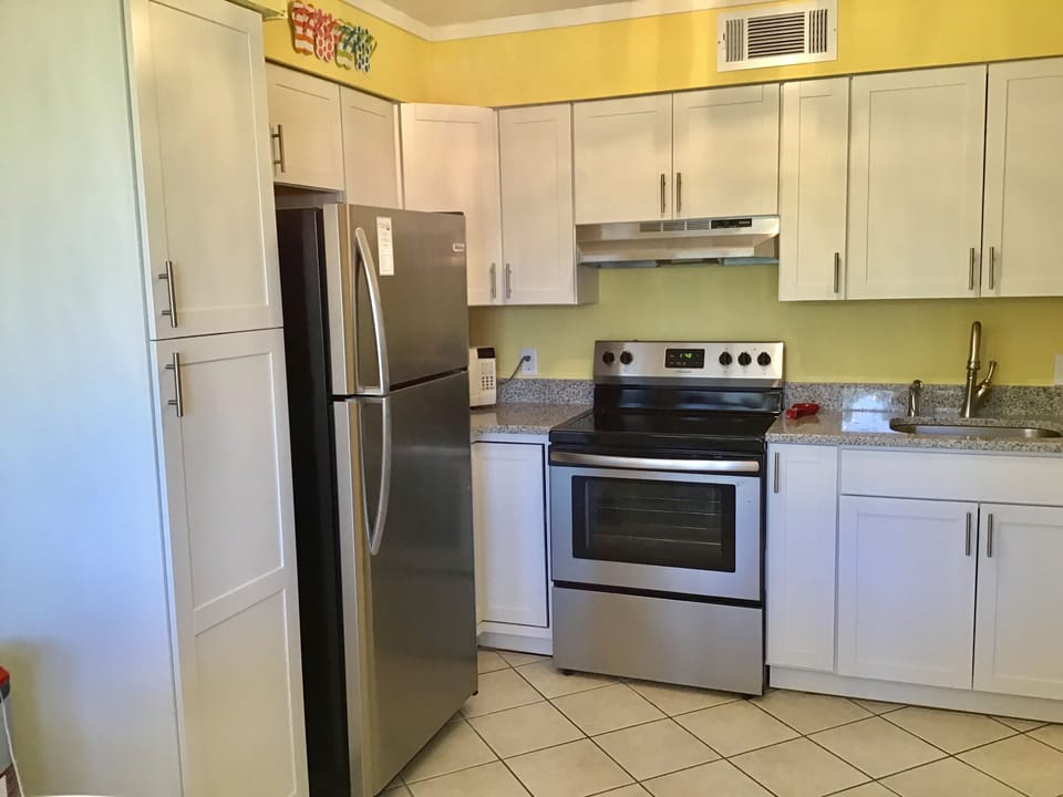 Full kitchen with granite countertops. 