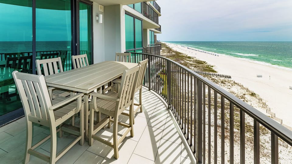 Your balcony invites quiet mornings with gulf breezes and gentle waves rolling along the shore