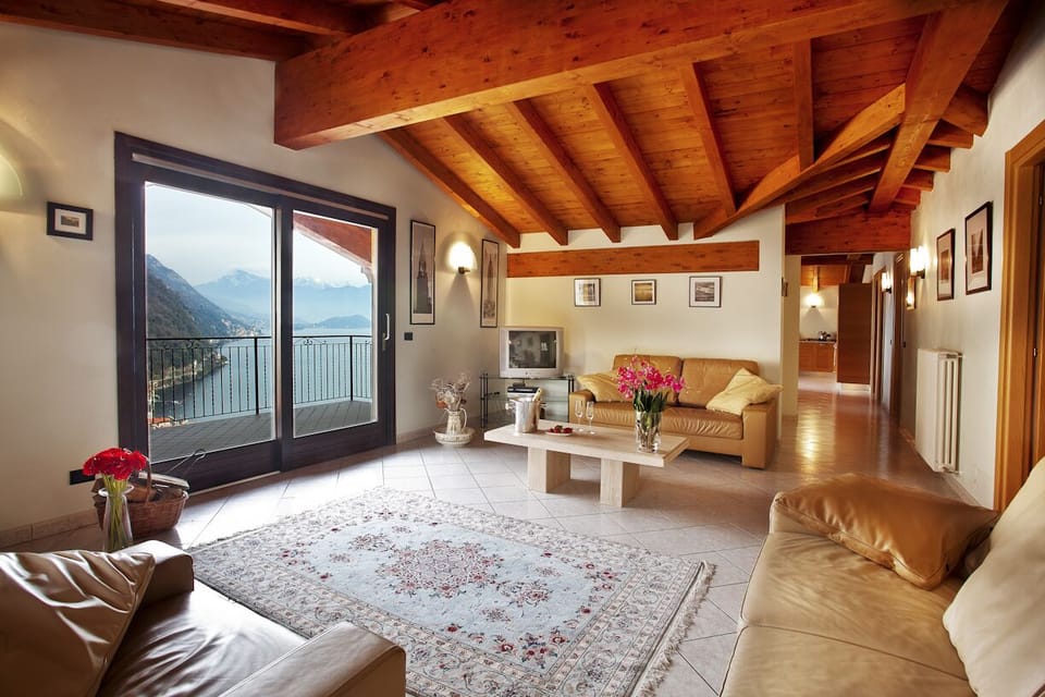 The penthouse boasts two comfy sofa's and a feature beam ceiling.
