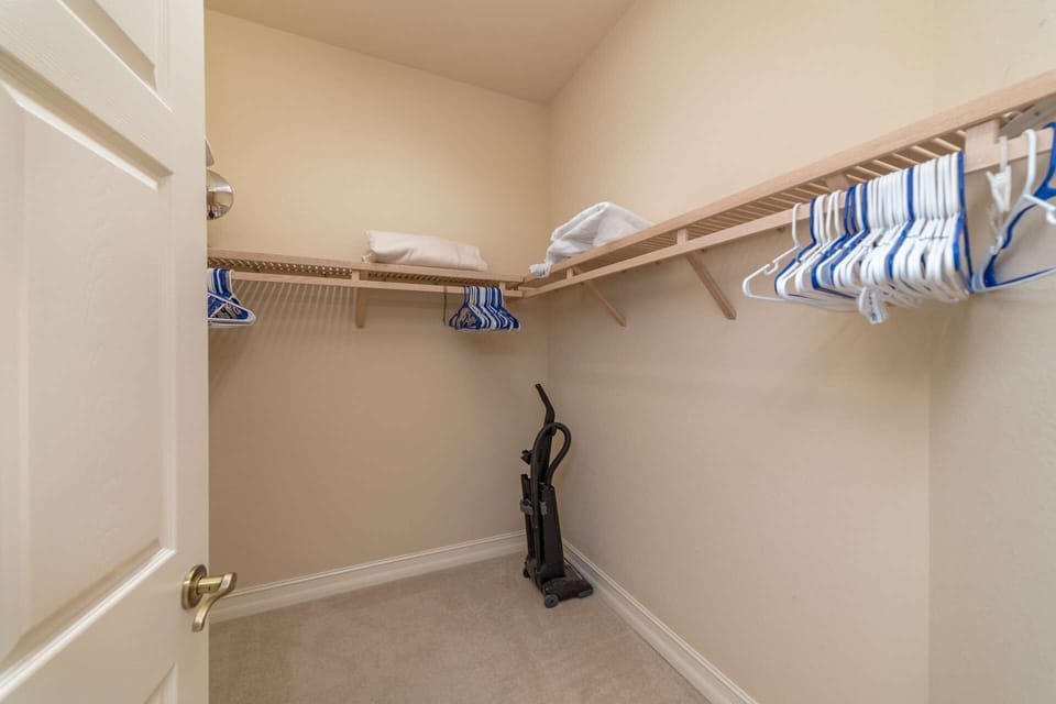 Master Bedroom Closet. (And feel free to vacuum the house while you’re on vacation ;-)
