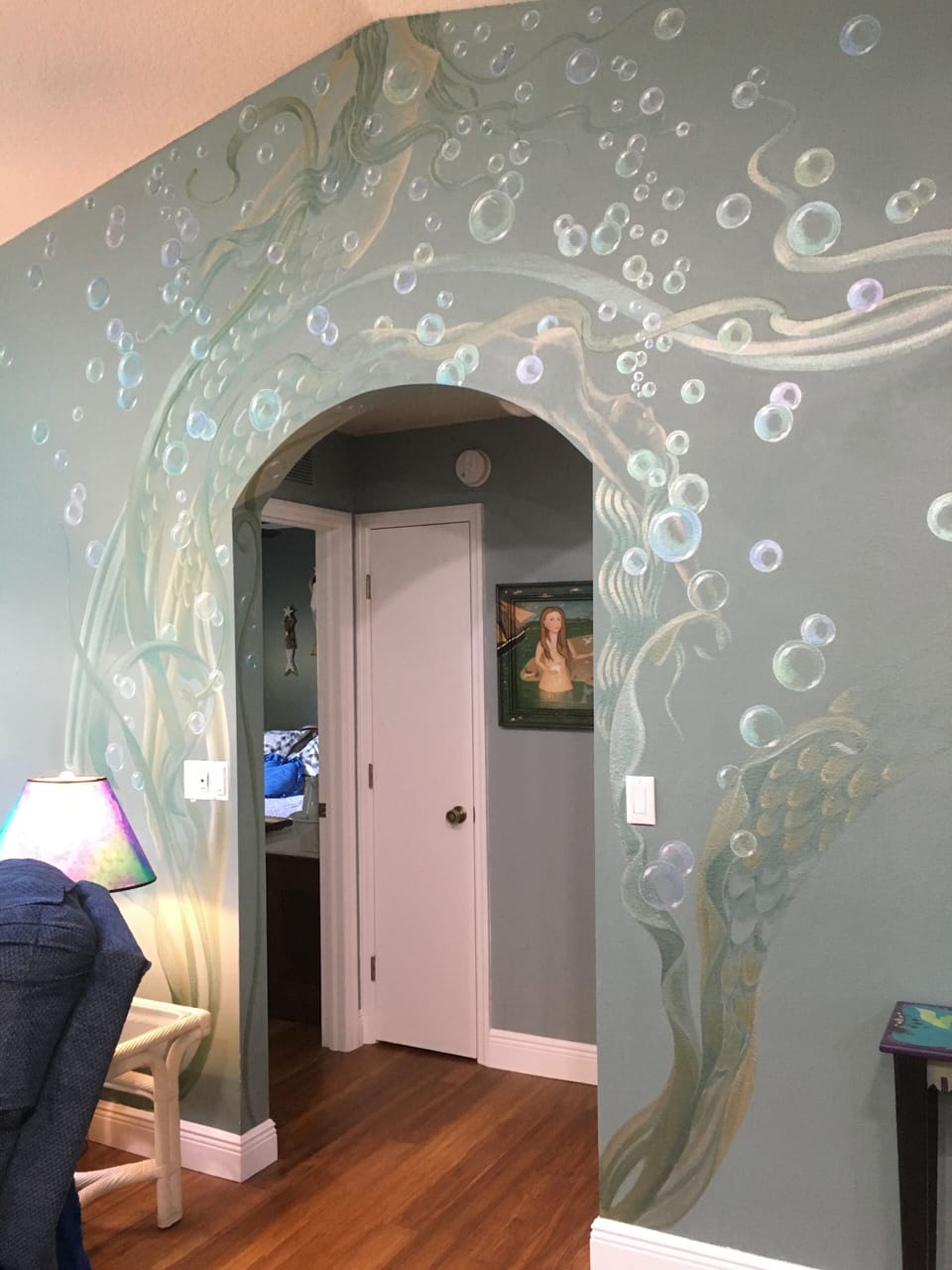 hand painted murals and original artwork through out the home. 