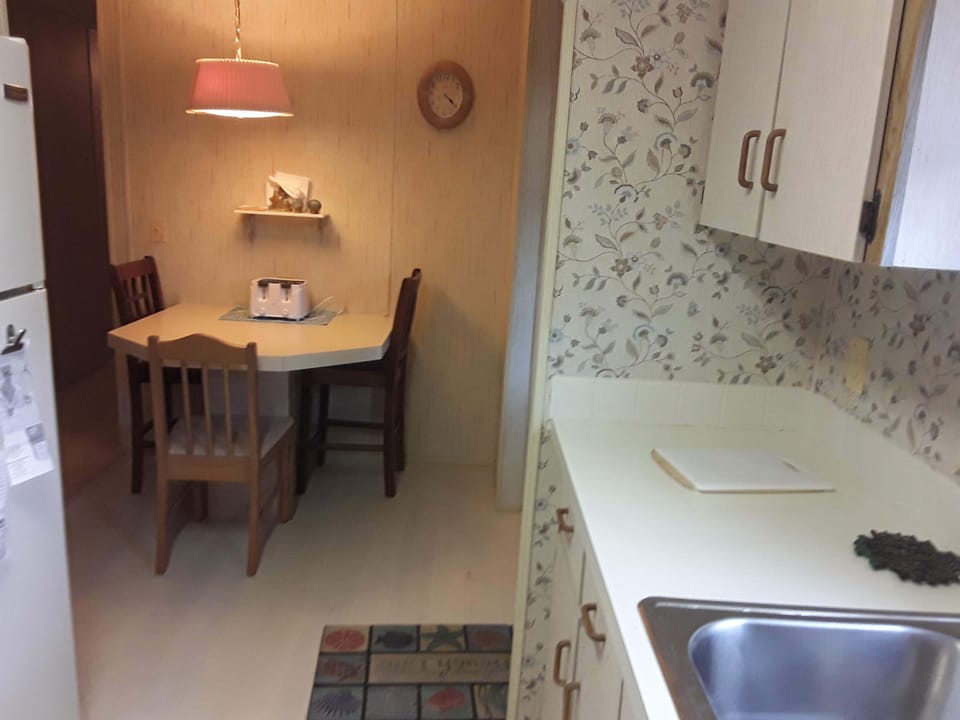 Kitchen looking into breakfast nook