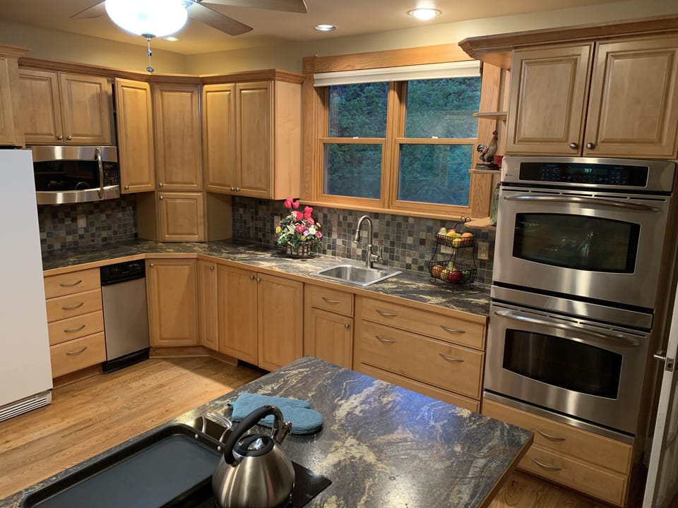 Double Ovens, Vegetable Sink, Microwave, Trash Compactor 