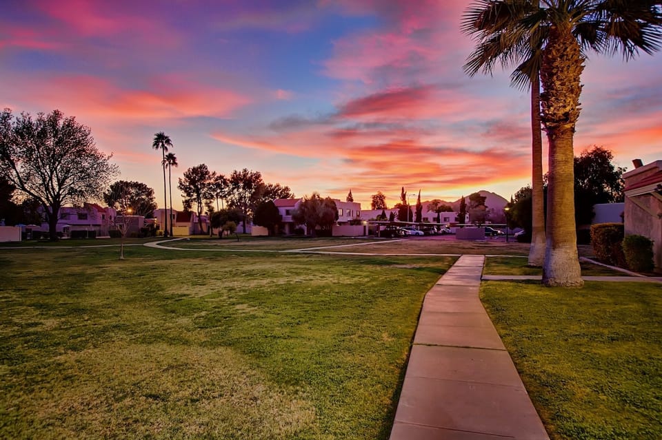 Stunning community with tons of open grass areas and mature palms.