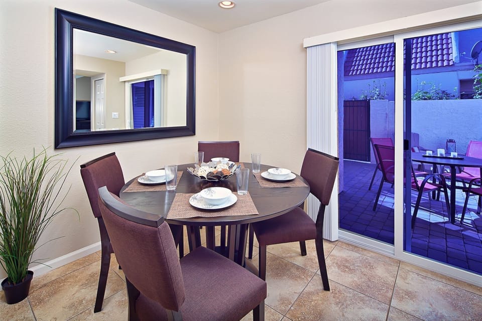 Kitchen eating area with patio access.
