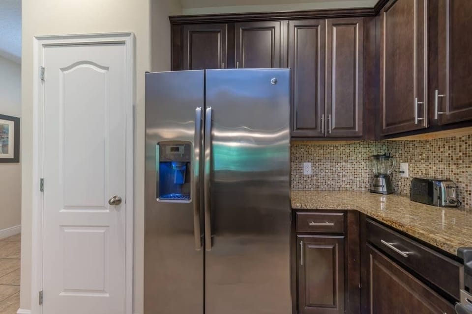 Pantry, Refrigerator with ice maker and water dispenser. 