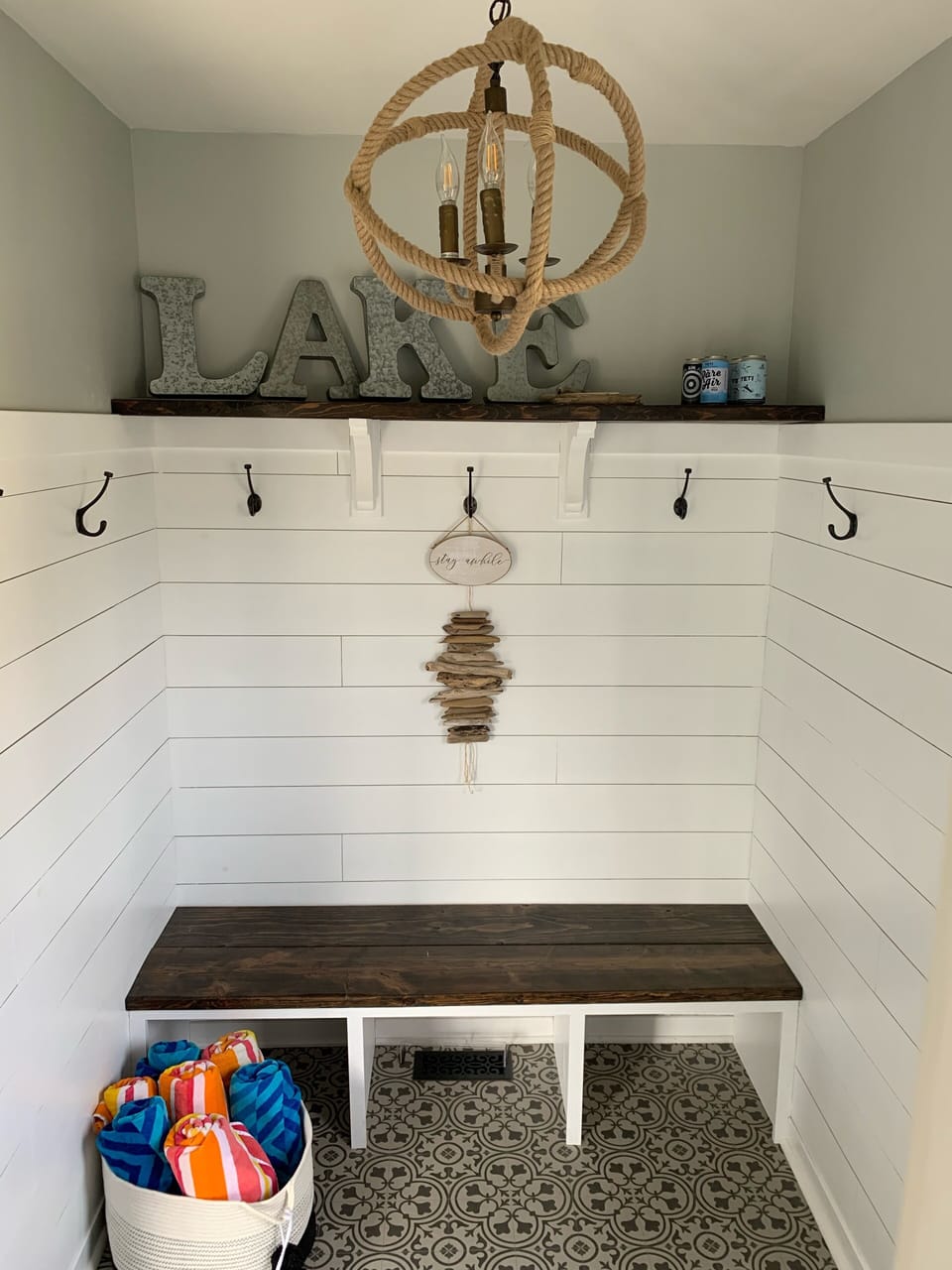 Mudroom off of side entrance. Beach towels provided.