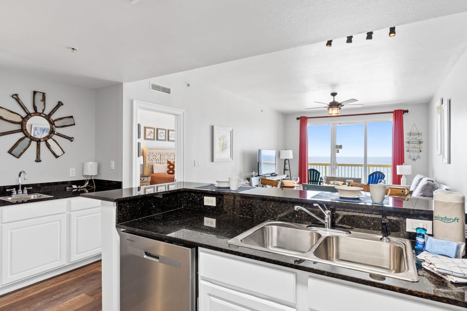 Fully Stocked Kitchen with Bar Seating