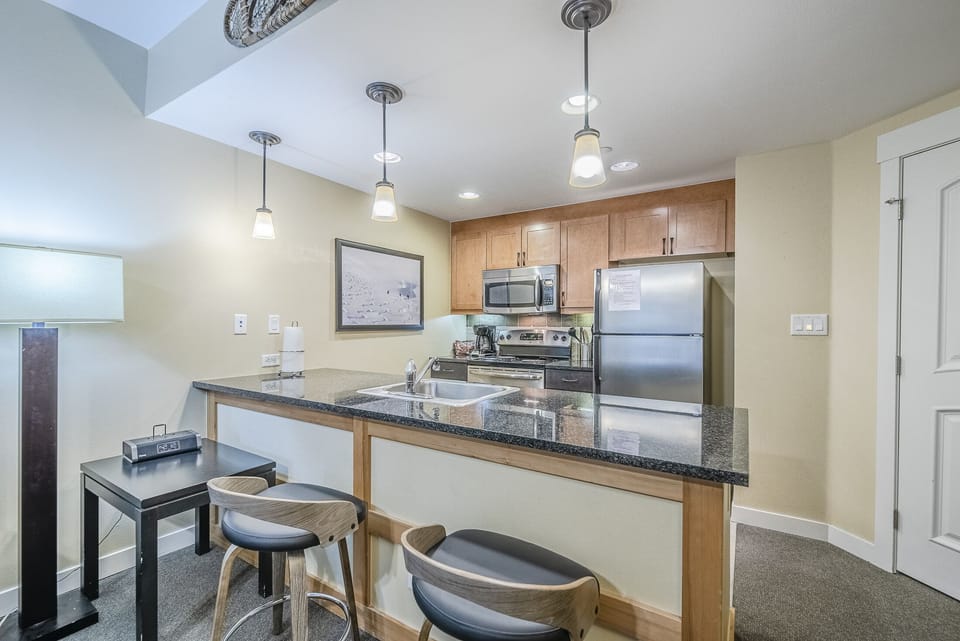 Kitchen - Additional seating at the kitchen counter.