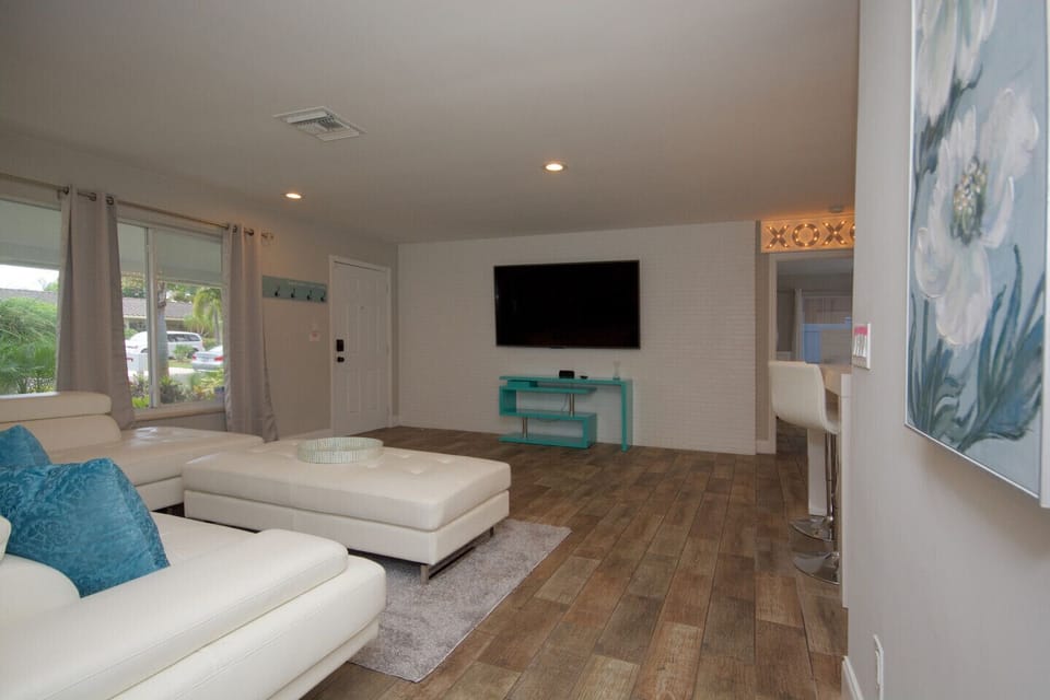 COZY FAMILY ROOM WITH FLAT SCREEN TV