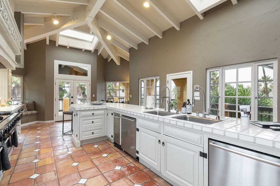 The kitchen has dual dishwashers for larger dinners