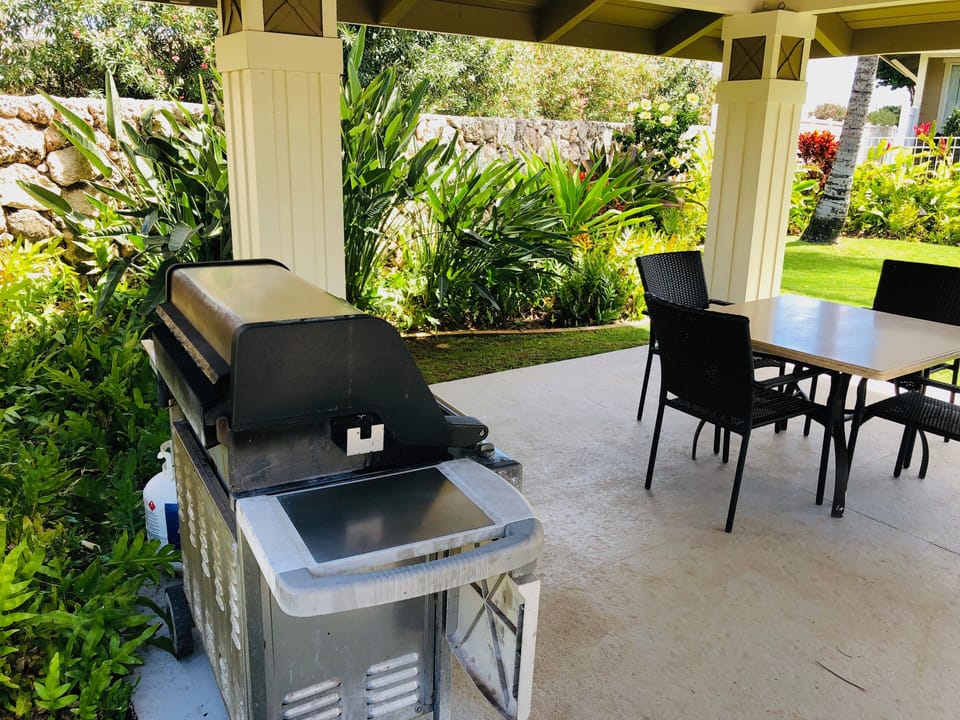 BBQ and tables in the rec area of the complex