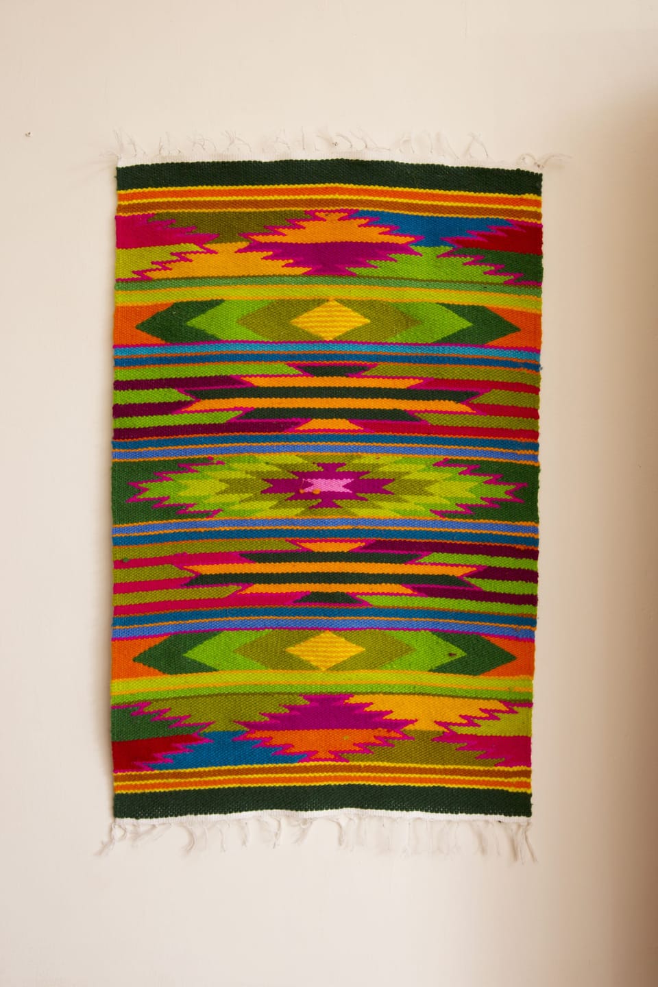 Ecuadorian tapestry adorning living room